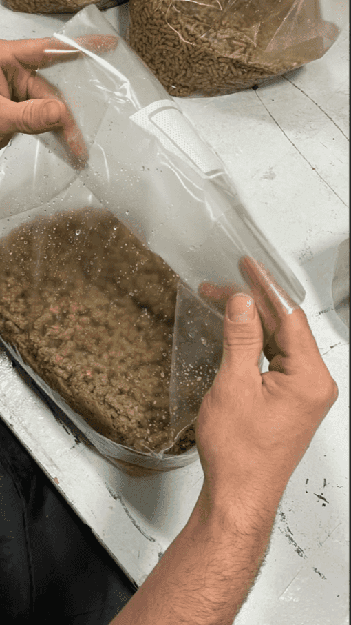 Hands hydrating substrate in a filter patch bag